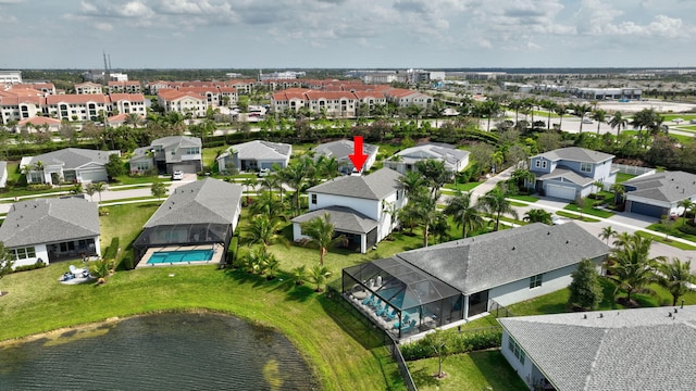 aerial view with a water view and a residential view