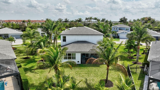 birds eye view of property with a residential view