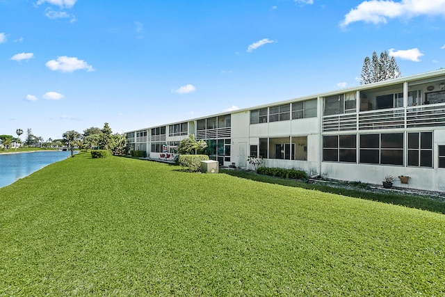 exterior space with a water view