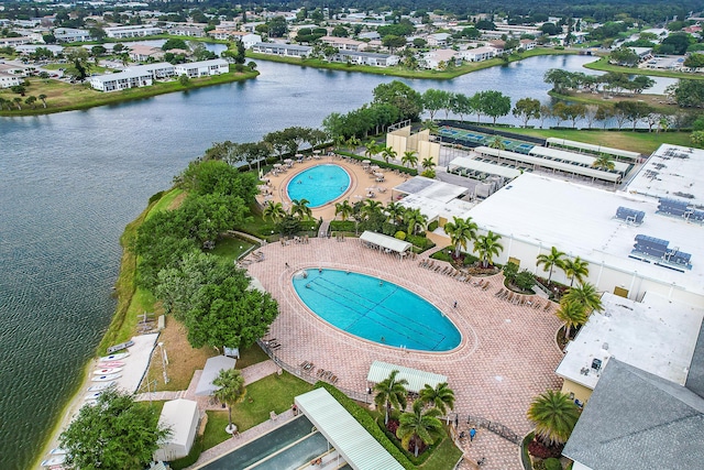 drone / aerial view with a water view