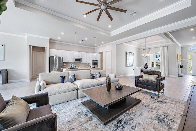 living room featuring light tile patterned floors, ornamental molding, and a raised ceiling