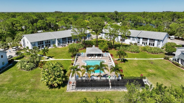 aerial view featuring a wooded view