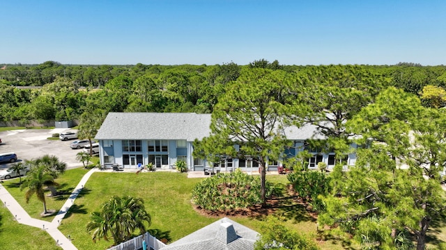 bird's eye view featuring a forest view