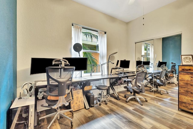 office area featuring a ceiling fan and wood finished floors