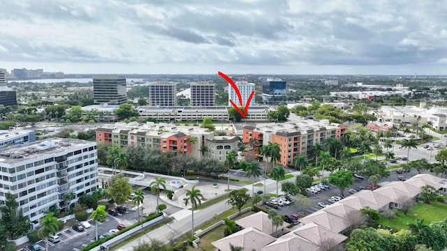 birds eye view of property with a city view