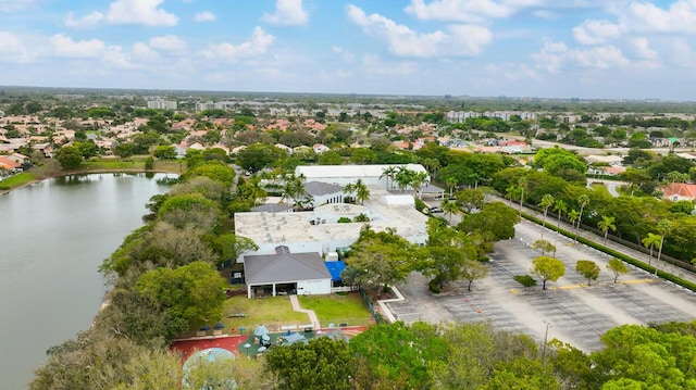 bird's eye view with a water view and a residential view