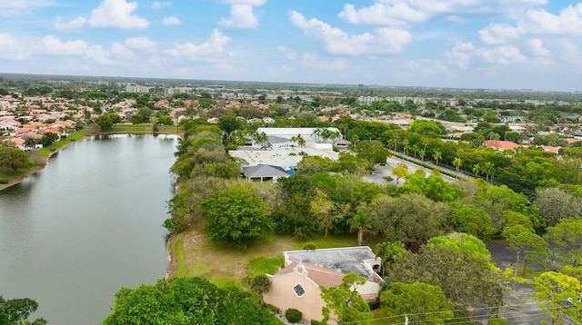 birds eye view of property with a residential view and a water view