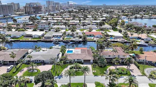 aerial view featuring a residential view and a water view