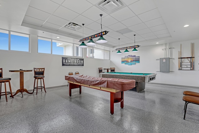 game room featuring pool table, plenty of natural light, and a drop ceiling