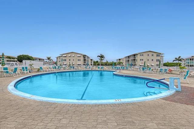 view of pool featuring a patio