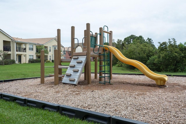 communal playground with a lawn