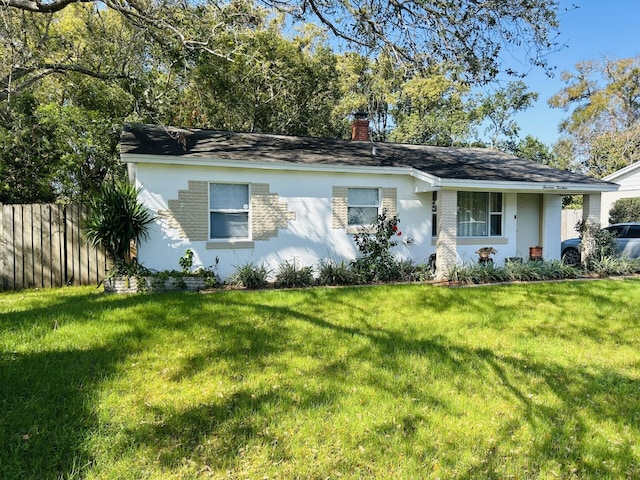 ranch-style house with a front yard