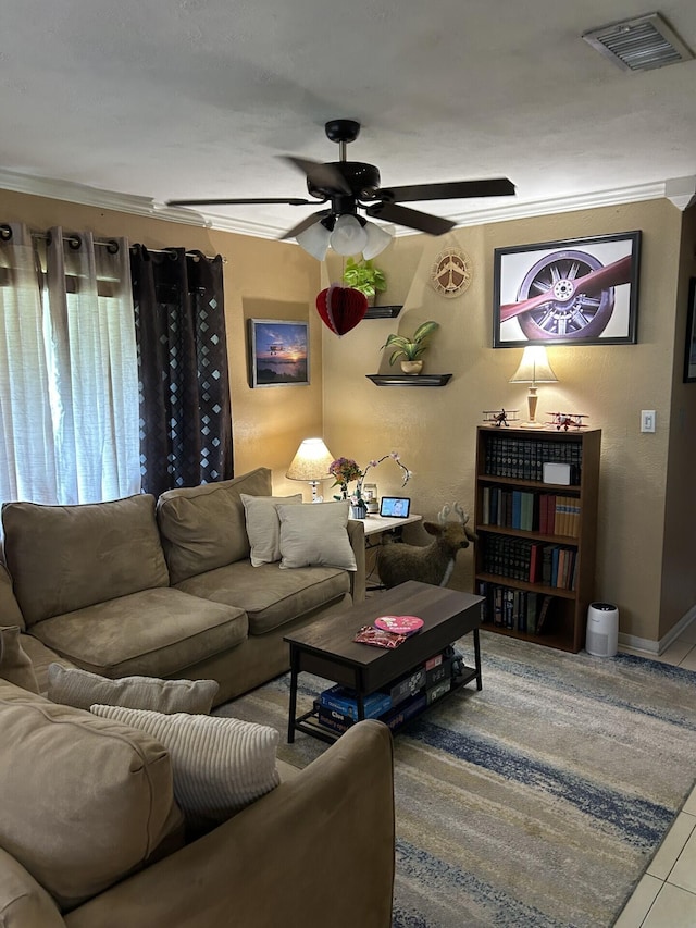 tiled living room with ceiling fan