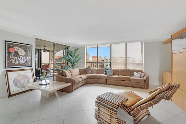 living area featuring light tile patterned flooring and floor to ceiling windows