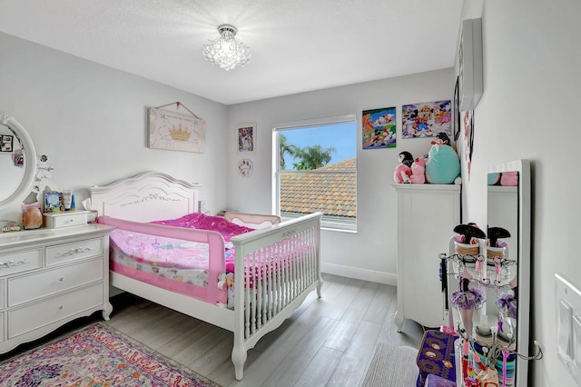 bedroom featuring light hardwood / wood-style floors