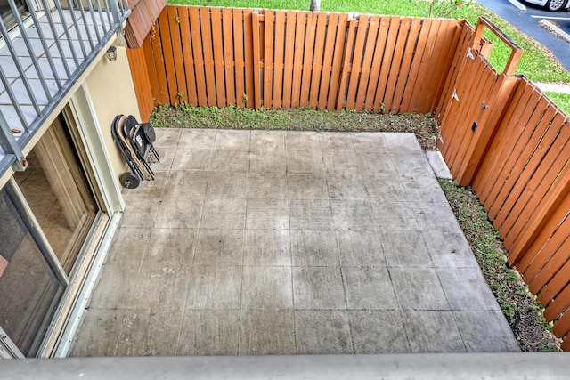 exterior details featuring a fenced backyard