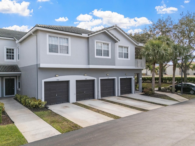 view of front of home with a garage