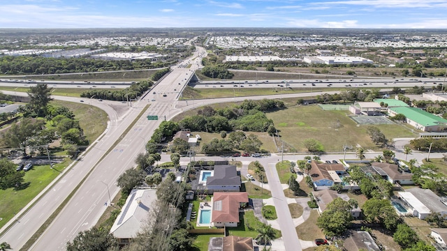 birds eye view of property with a residential view