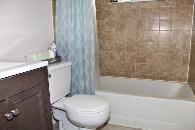 full bathroom featuring vanity, shower / tub combo, and toilet