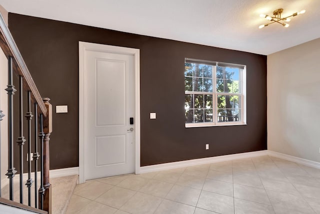 220 S Federal Hwy Unit 4, Lake Worth Beach, FL 33460 - foyer entrance with stairway, baseboards, and light tile patterned floors