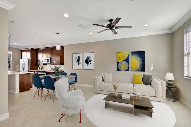 220 S Federal Hwy Unit 4, Lake Worth Beach, FL 33460 - living area with recessed lighting, ornamental molding, baseboards, light tile patterned flooring, and a ceiling fan