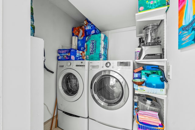 laundry area featuring laundry area and washing machine and dryer