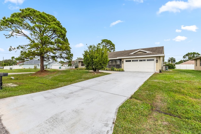 ranch-style home with a front lawn and a garage