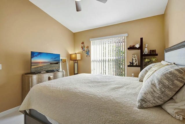 bedroom with ceiling fan and lofted ceiling