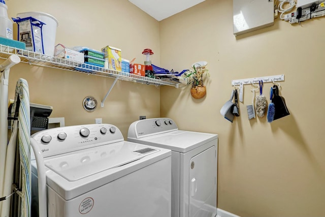 washroom featuring washer and dryer