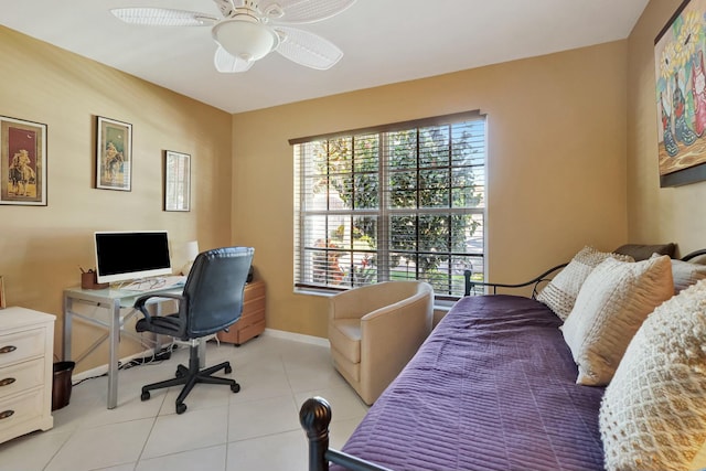 tiled bedroom with ceiling fan