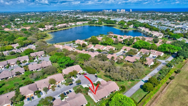 aerial view with a water view and a residential view