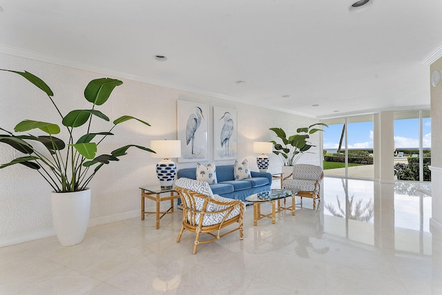 interior space featuring a textured wall, ornamental molding, a wall of windows, and baseboards