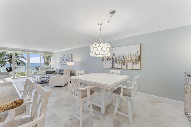 dining space featuring ornamental molding, a wall of windows, and baseboards