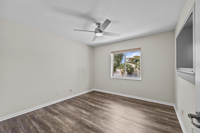 3036 Calle Valencia, West Palm Beach, FL 33409 - unfurnished room featuring dark wood-type flooring, a ceiling fan, and baseboards