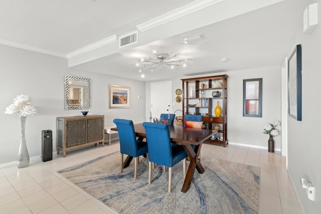 dining area featuring visible vents, crown molding, baseboards, and light tile patterned flooring