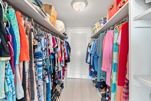 walk in closet featuring light tile patterned floors