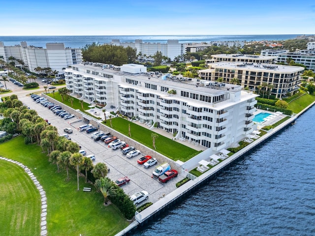 birds eye view of property featuring a water view