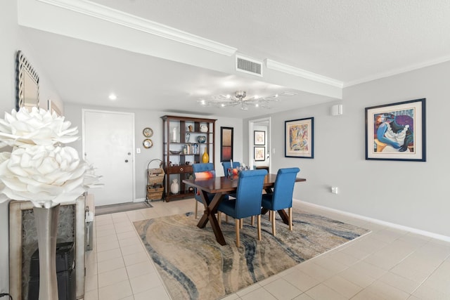 dining space with crown molding, visible vents, light tile patterned flooring, a textured ceiling, and baseboards