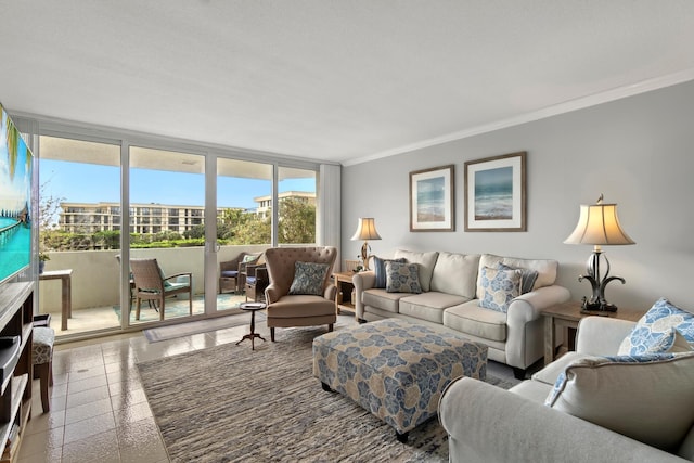 living room featuring ornamental molding and floor to ceiling windows