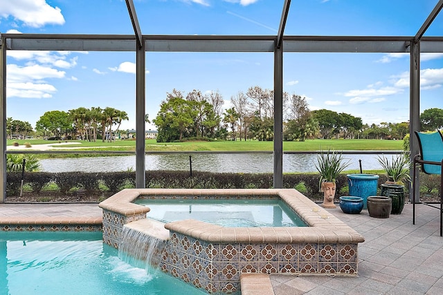 view of pool featuring an in ground hot tub, glass enclosure, and a water view