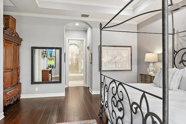 corridor featuring crown molding, dark hardwood / wood-style flooring, and a raised ceiling