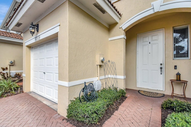 entrance to property with a garage