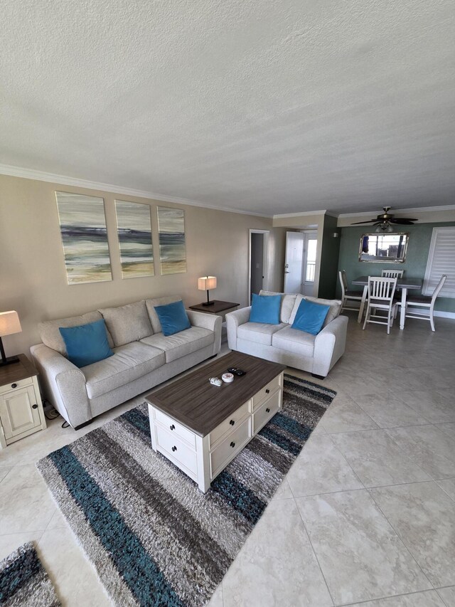 2400 S Ocean Dr Unit 2328, Fort Pierce, FL 34949 - living room with ornamental molding, a textured ceiling, and a ceiling fan