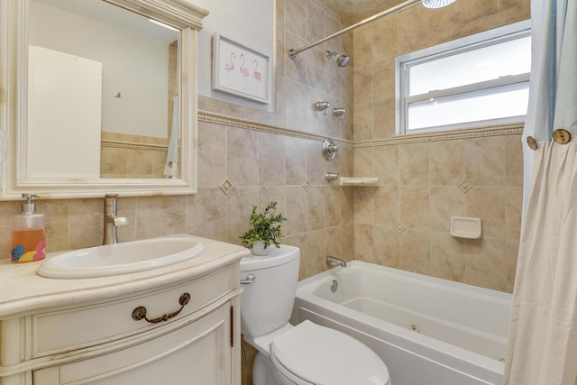 full bathroom with shower / tub combo, toilet, tile walls, and vanity