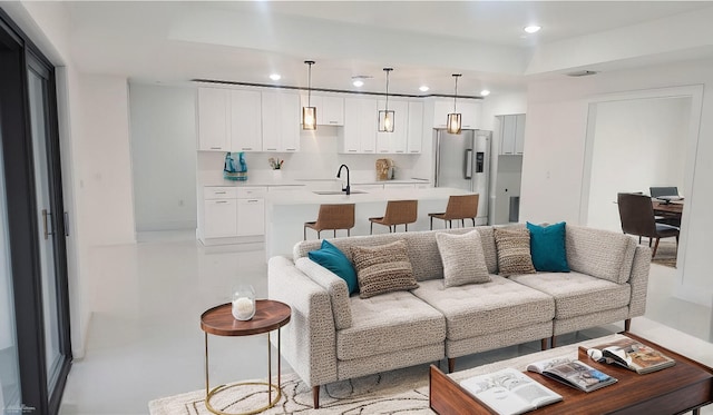 living room featuring sink