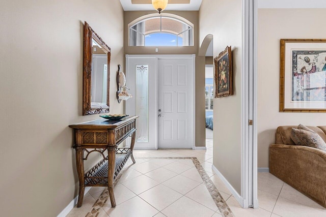 entrance foyer with light tile patterned floors