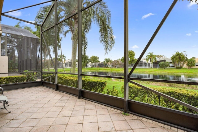 7357 Marbella Echo Dr, Delray Beach, FL 33446 - unfurnished sunroom featuring a water view and plenty of natural light