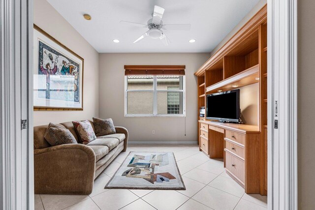 7357 Marbella Echo Dr, Delray Beach, FL 33446 - tiled living room featuring ceiling fan and built in desk
