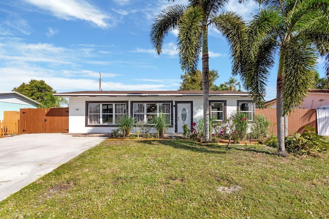 ranch-style house with a front yard