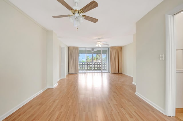 spare room with light hardwood / wood-style flooring